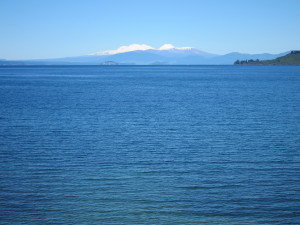 Lake Taupo with snow capped mountains behind
