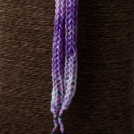 Purple Pink French Knit Long Lariat Beaded Front close up thin tassel and beads